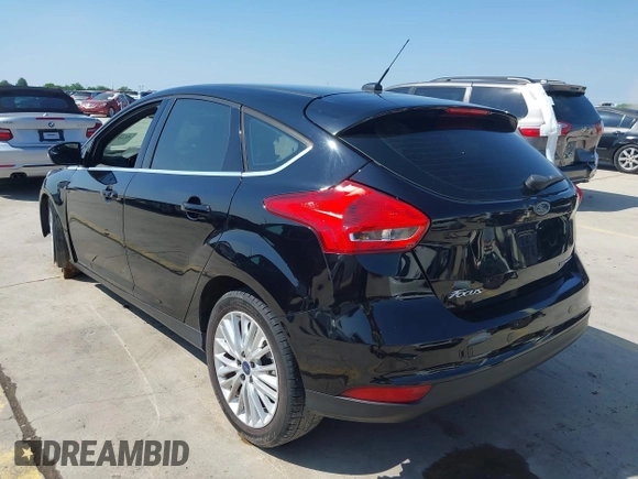 2018 Ford Focus Titanium with VIN 1FADP3N21JL289677, listed as a IAAI auction lot 42183812 with Not provided miles and . Bid and sale history available at DreamBid. Image 3.