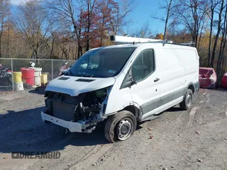 2023 Ford Transit Cargo with VIN 1FTBR1Y86PKA79798, listed as a IAAI auction lot 40155361 with 28,670 mi miles and . Bid and sale history available at DreamBid. Image 6.
