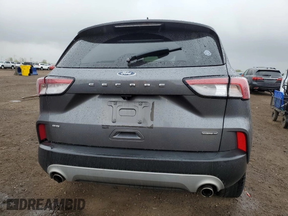 2021 Ford Escape SE Hybrid with VIN 1FMCU9BZ3MUA68658, listed as a Copart auction lot 55977435 with 149,167 mi miles and Salvage title. Bid and sale history available at DreamBid. Image 6.