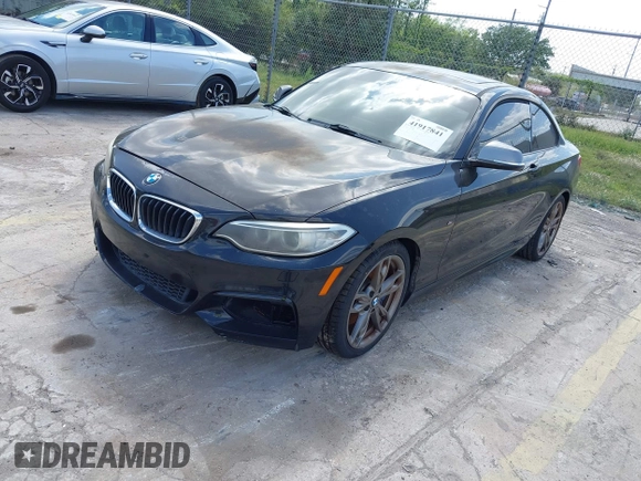 2014 BMW 2 Series M235i with VIN WBA1J7C50EVW84072, listed as a IAAI auction lot 41917841 with 102,745 mi miles and . Bid and sale history available at carsss.com. Image 17.