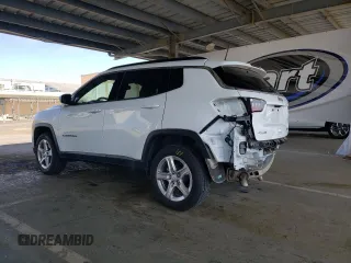 2023 Jeep Compass Latitude z VIN 3C4NJDBN0PT561850, wystawiony jako Copart lot #60563465 z przebiegiem 50 881 mil mil oraz Czysty tytuł • Clean title. Historia ofert i sprzedaży dostępna na DreamBid. Obrazek 2.