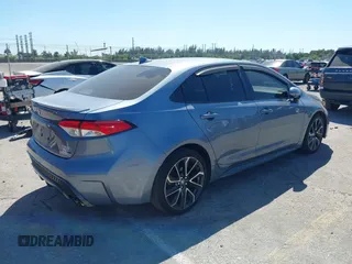 2021 Toyota Corolla SE with VIN JTDS4MCE1MJ063524, listed as a IAAI auction lot 41822622 with 50,882 mi miles. Bid and sale history available at carsss.com. Image 4.