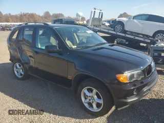 2003 BMW X5 3.0i with VIN 5UXFA53563LV96891, listed as a Copart auction lot 77636084 with 0 mi miles and Salvage Title. Bid and sale history available at carsss.com. Image 4.
