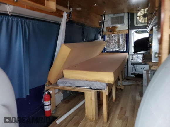 2007 Ford Econoline Passenger XL with VIN 1FBNE31L57DB32163, listed as a Copart auction lot 78957983 with 115,634 mi miles and Clean Title. Bid and sale history available at carsss.com. Image 10.
