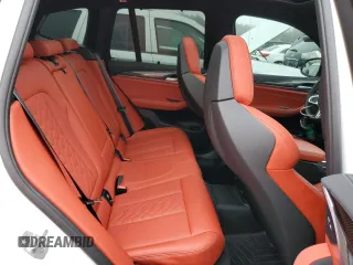 2020 BMW X3 M Competition z VIN 5YMTS0C01L9B23531, wystawiony jako Copart lot #73470892 z przebiegiem 27 432 mil mil oraz . Historia ofert i sprzedaży dostępna na DreamBid. Obrazek 10.