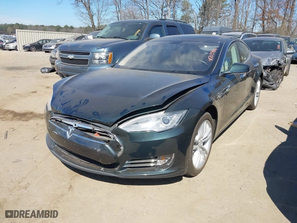 2013 Tesla Model S with VIN 5YJSA1DN3DFP12852, listed as a IAAI auction lot 41703966 with 81,589 mi miles. Bid and sale history available at carsss.com. Image 17.
