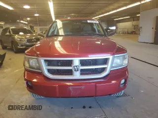 2008 Dodge Dakota SXT z VIN 1D7HW38K18S581829, wystawiony jako Copart lot #76459194 z przebiegiem 197 406 mil mil oraz Czysty tytuł • Clean title. Historia ofert i sprzedaży dostępna na DreamBid. Obrazek 5.