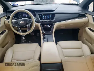 2017 Cadillac XT5 FWD with VIN 1GYKNARS8HZ162612, listed as a Copart auction lot 58727265 with 100,494 mi miles and Clean title. Bid and sale history available at DreamBid. Image 8.