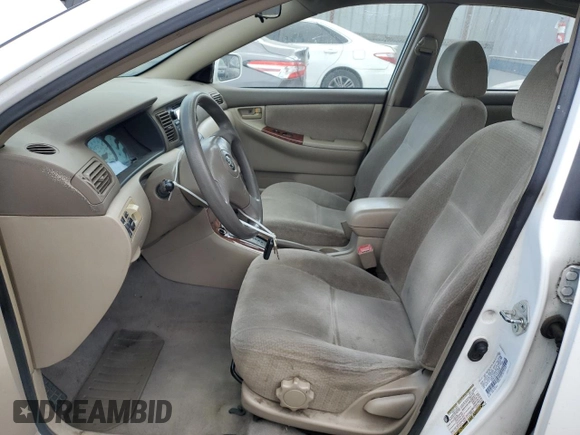2004 Toyota Corolla CE with VIN 1NXBR32E94Z291049, listed as a Copart auction lot 56949865 with 148,919 mi miles and Clean Title. Bid and sale history available at DreamBid. Image 7.