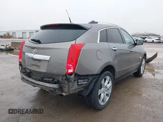 2011 Cadillac SRX Premium Collection with VIN 3GYFNFEY3BS610591, listed as a IAAI auction lot 41446148 with 147,959 mi miles. Bid and sale history available at carsss.com. Image 4.