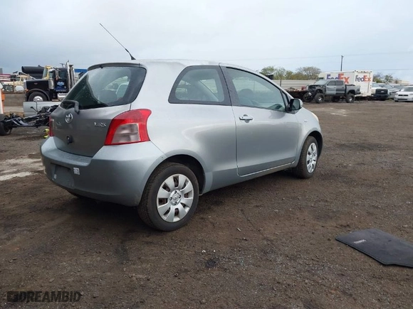 2007 Toyota Yaris with VIN JTDJT923175067632, listed as a IAAI auction lot 41471162 with 80,307 mi miles. Bid and sale history available at carsss.com. Image 4.