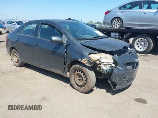 2009 Toyota Yaris with VIN JTDBT903891349784, listed as a IAAI auction lot 42135557 with 244,107 mi miles. Bid and sale history available at carsss.com. Image 1.