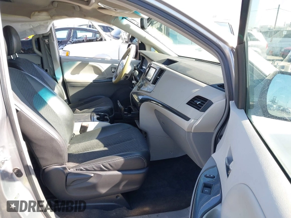 2012 Toyota Sienna SE with VIN 5TDXK3DC3CS189064, listed as a IAAI auction lot 42022390 with 193,016 mi miles and . Bid and sale history available at DreamBid. Image 5.