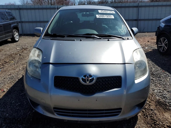2007 Toyota Yaris with VIN JTDJT923975057611, listed as a Copart auction lot 50801955 with 106,474 mi miles and Clean Title. Bid and sale history available at carsss.com. Image 5.