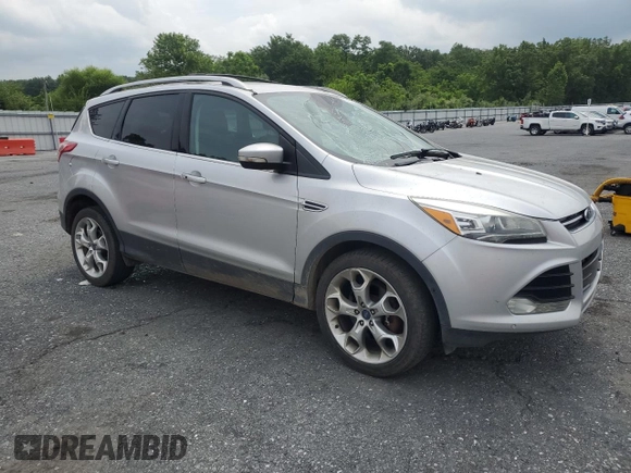 2013 Ford Escape Titanium with VIN 1FMCU9J9XDUB88989, listed as a Copart auction lot 64994445 with 192,833 mi miles and Salvage title. Bid and sale history available at DreamBid. Image 4.