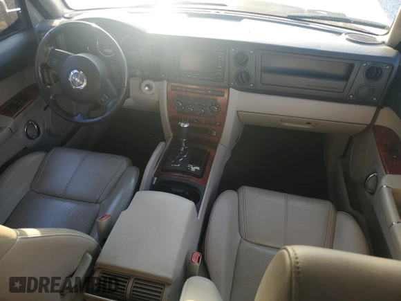 2006 Jeep Commander Limited z VIN 1J8HG58296C170388, wystawiony jako Copart lot #61134795 z przebiegiem 117 992 mil mil oraz Szkoda całkowita • Salvage title. Historia ofert i sprzedaży dostępna na DreamBid. Obrazek 8.