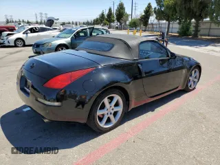 2004 Nissan 350Z Touring with VIN JN1AZ36A34T010010, listed as a Copart auction lot 64837084 with 97,180 mi miles and Salvage Title. Bid and sale history available at carsss.com. Image 3.