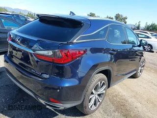 2022 Lexus RX with VIN 2T2HZMAA6NC253324, listed as a IAAI auction lot 36137292 with 6,266 mi miles. Bid and sale history available at carsss.com. Image 4.