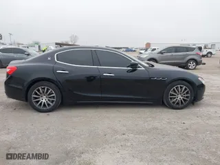 2014 Maserati Ghibli S Q4 with VIN ZAM57RTA1E1090122, listed as a IAAI auction lot 41510399 with 46,237 mi miles. Bid and sale history available at carsss.com. Image 13.