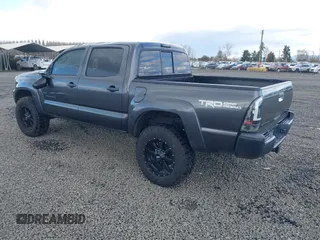 2013 Toyota Tacoma with VIN 3TMLU4ENXDM105967, listed as a IAAI auction lot 41819211 with 121,012 mi miles and . Bid and sale history available at DreamBid. Image 3.