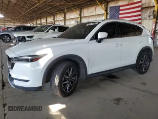 2018 Mazda CX-5 Grand Touring with VIN JM3KFADM5J0309062, listed as a Copart auction lot 62366385 with 94,210 mi miles and Salvage title. Bid and sale history available at DreamBid. Image 1.