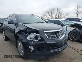 2011 Cadillac SRX Premium Collection z VIN 3GYFNFEY6BS675547, wystawiony jako IAAI lot #41836567 z przebiegiem 97 518 mil mil oraz . Historia ofert i sprzedaży dostępna na DreamBid. Obrazek 1.