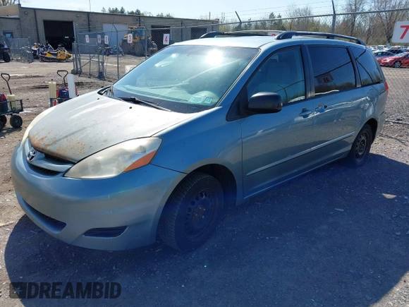 2009 Toyota Sienna CE with VIN 5TDZK23C29S275687, listed as a IAAI auction lot 42142599 with 140,729 mi miles. Bid and sale history available at carsss.com. Image 2.
