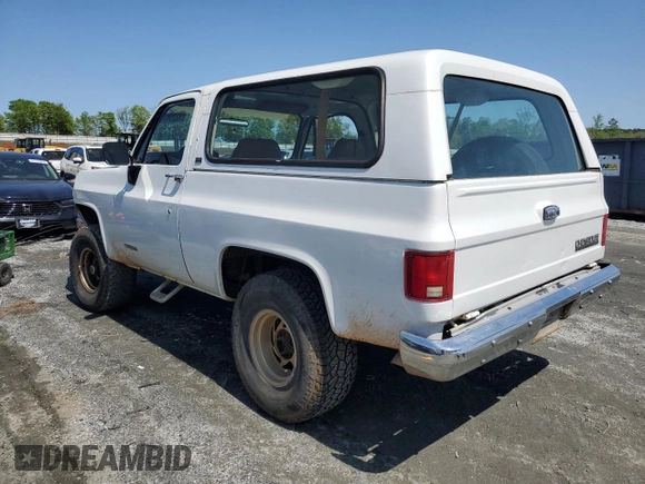 1990 Chevrolet Blazer z VIN 1GNEV18K5LF144221, wystawiony jako Copart lot #52296175 z przebiegiem 114 593 mil mil oraz Szkoda całkowita • Salvage title. Historia ofert i sprzedaży dostępna na DreamBid. Obrazek 2.