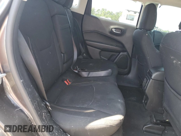 2018 Jeep Compass Sport with VIN 3C4NJCABXJT105430, listed as a Copart auction lot 59237575 with 104,600 mi miles and Salvage title. Bid and sale history available at DreamBid. Image 11.