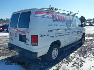 2014 Ford Econoline Cargo Commercial with VIN 1FTNE2EW3EDA18900, listed as a IAAI auction lot 41209002 with 138,014 mi miles. Bid and sale history available at carsss.com. Image 4.