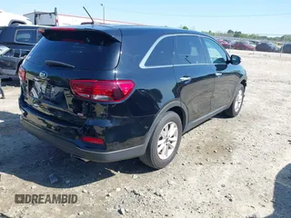 2019 Kia Sorento L with VIN 5XYPG4A38KG574269, listed as a IAAI auction lot 42003610 with 129,896 mi miles and . Bid and sale history available at DreamBid. Image 4.