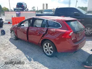 2016 Volvo V60 T5 Drive-E Platinum with VIN YV140MEM5G1294952, listed as a IAAI auction lot 40197364 with 107,641 mi miles. Bid and sale history available at carsss.com. Image 3.