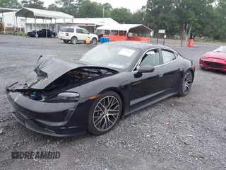 2022 Porsche Taycan 4S z VIN WP0AB2Y12NSA43485, wystawiony jako IAAI lot #42339411 z przebiegiem 16 371 mil mil oraz . Historia ofert i sprzedaży dostępna na DreamBid. Obrazek 2.