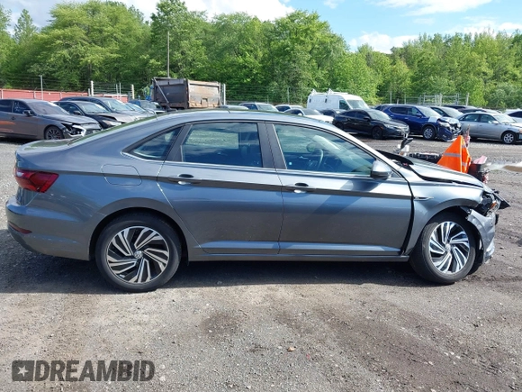 2020 Volkswagen Jetta SEL z VIN 3VWEB7BU2LM024016, wystawiony jako IAAI lot #42341318 z przebiegiem 40 480 mil mil oraz . Historia ofert i sprzedaży dostępna na DreamBid. Obrazek 13.