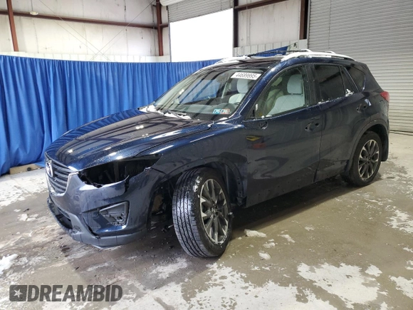 2016 Mazda CX-5 Grand Touring with VIN JM3KE4DY9G0708024, listed as a Copart auction lot 44689995 with 113,002 mi miles and Salvage Title. Bid and sale history available at DreamBid. Image 1.