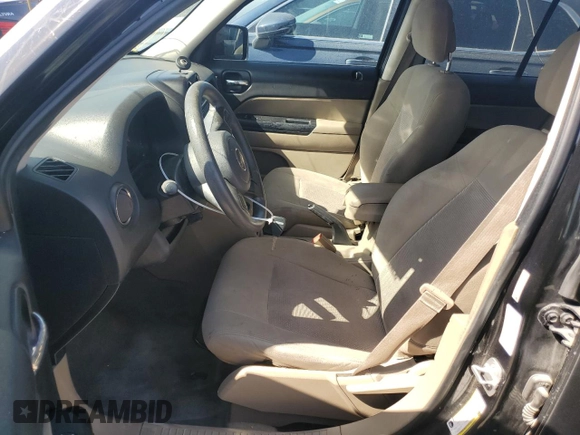 2014 Jeep Patriot Altitude with VIN 1C4NJPBA2ED851122, listed as a Copart auction lot 52588795 with 160,258 mi miles and Salvage Title. Bid and sale history available at DreamBid. Image 7.