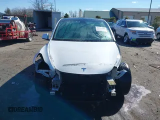 2021 Tesla Model Y Long Range with VIN 5YJYGAEE6MF196610, listed as a IAAI auction lot 41516909 with 30,431 mi miles. Bid and sale history available at carsss.com. Image 13.