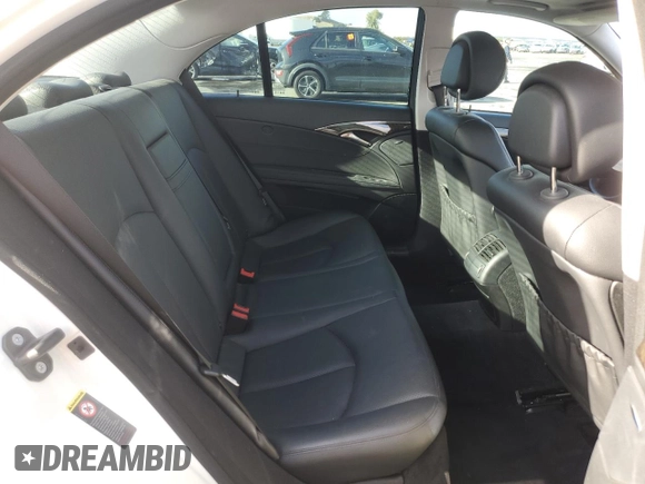 2007 Mercedes-Benz E-Class 3.5L with VIN WDBUF56X47B084760, listed as a Copart auction lot 84942024 with 117,213 mi miles and Salvage Title. Bid and sale history available at carsss.com. Image 10.
