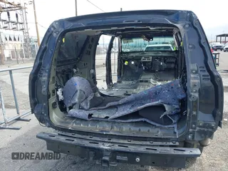 2015 Cadillac Escalade ESV Premium z VIN 1GYS4JKJ4FR221771, wystawiony jako IAAI lot #41752472 z przebiegiem Nie podano mil oraz . Historia ofert i sprzedaży dostępna na DreamBid. Obrazek 16.