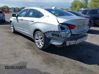 2015 Chevrolet Impala LTZ with VIN 2G1165S34F9101489, listed as a IAAI auction lot 42141525 with 149,037 mi miles and . Bid and sale history available at DreamBid. Image 3.