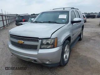 2011 Chevrolet Tahoe LT with VIN 1GNSCBE05BR190310, listed as a IAAI auction lot 42243623 with 249,453 mi miles and . Bid and sale history available at DreamBid. Image 2.