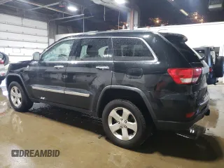 2013 Jeep Grand Cherokee Overland with VIN 1C4RJFCG7DC646348, listed as a Copart auction lot 49526415 with 137,889 mi miles and Clean Title. Bid and sale history available at carsss.com. Image 2.