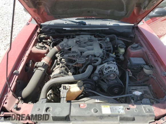 2004 Ford Mustang Deluxe with VIN 1FAFP44674F211829, listed as a Copart auction lot 49388445 with 107,427 mi miles and Salvage Title. Bid and sale history available at carsss.com. Image 11.