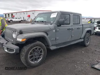 2022 Jeep Gladiator High Altitude with VIN 1C6HJTFG4NL131029, listed as a IAAI auction lot 41789060 with 50,347 mi miles and . Bid and sale history available at DreamBid. Image 2.