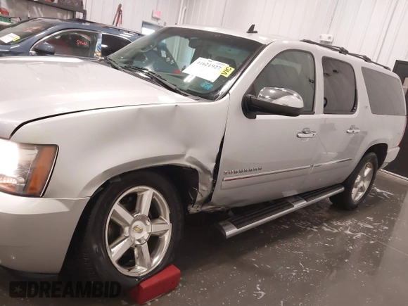 2011 Chevrolet Suburban LTZ with VIN 1GNSKKE31BR143238, listed as a IAAI auction lot 41621927 with 224,313 mi miles and . Bid and sale history available at DreamBid. Image 6.