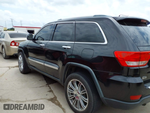 2013 Jeep Grand Cherokee Overland with VIN 1C4RJECT2DC588124, listed as a IAAI auction lot 42142573 with 204,309 mi miles and . Bid and sale history available at DreamBid. Image 14.