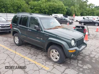 2002 Jeep Liberty Limited with VIN 1J4GL58K32W180061, listed as a IAAI auction lot 42644030 with 105,668 mi miles and . Bid and sale history available at DreamBid. Image 1.