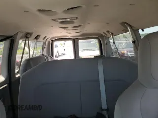 2009 Ford Econoline Passenger XL with VIN 1FBNE31L59DA62487, listed as a Copart auction lot 58073325 with 122,664 mi miles and Salvage title. Bid and sale history available at DreamBid. Image 10.