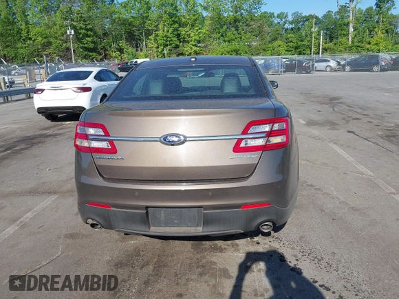 2016 Ford Taurus Limited z VIN 1FAHP2F81GG109548, wystawiony jako IAAI lot #42177871 z przebiegiem 168 611 mil mil oraz . Historia ofert i sprzedaży dostępna na DreamBid. Obrazek 16.