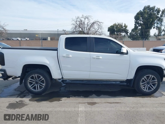 2021 Chevrolet Colorado 2WD Work Truck z VIN 1GCGSBENXM1118310, wystawiony jako IAAI lot #41668804 z przebiegiem 65 295 mil mil oraz . Historia ofert i sprzedaży dostępna na DreamBid. Obrazek 14.
